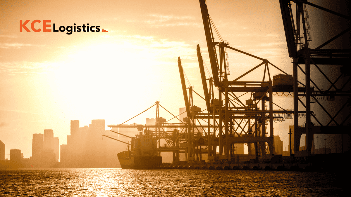 KCE Logistics port cranes at dusk, representing robust operational control over complex intermodal networks.